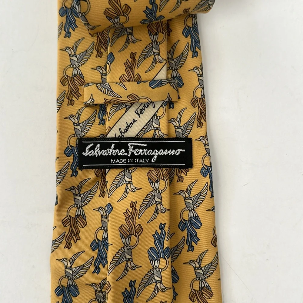 Salvatore Ferragamo 100% Silk yellow tie with birds pattern blue / yellow tones